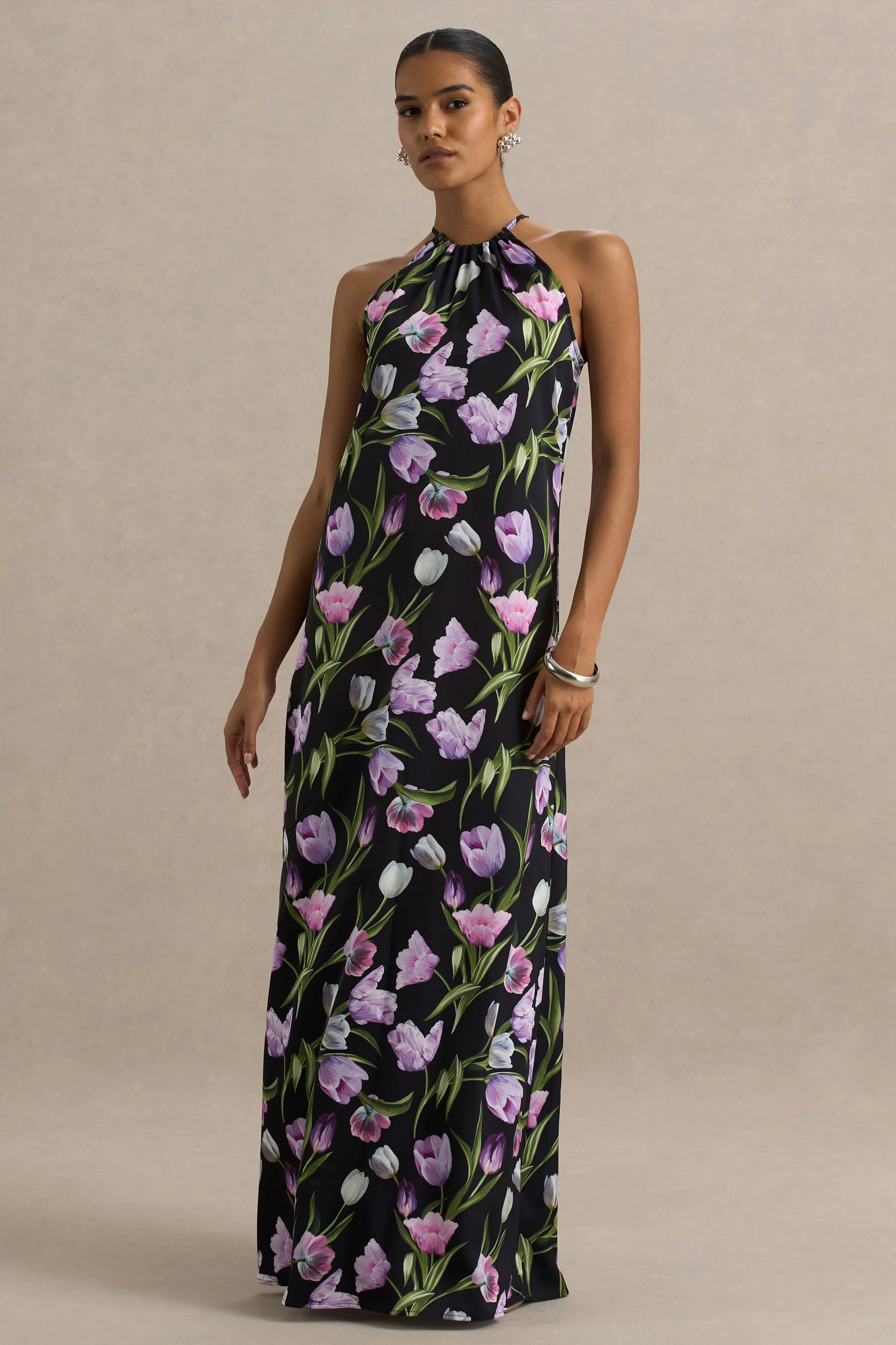 Svana | Zwarte Satijnen Bloemenprint Asymmetrische Halter Nek Maxi Jurk - Image 5
